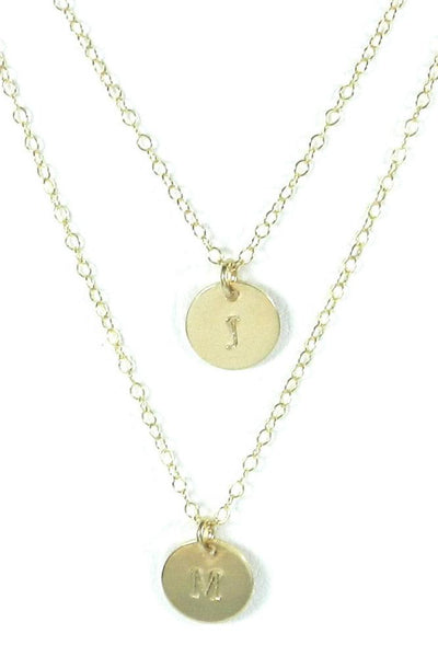 Layered Initial Charm Necklace.