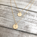 Layered Initial Charm Necklace.